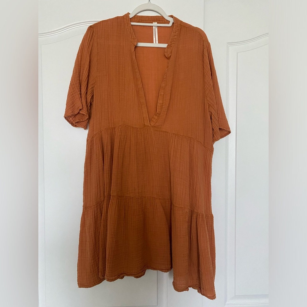 Anthropologie dress in size L. Light gauzy material. Rust orange.